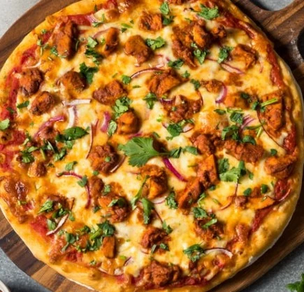 Delicious Butter Chicken Pizza at Star 6 Pizza in Richmond, BC